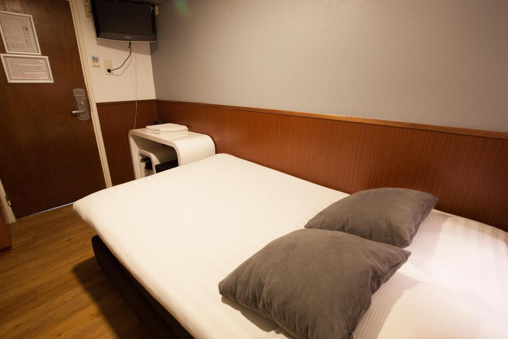 Travel Hotel Amsterdam Oda fotoğraf